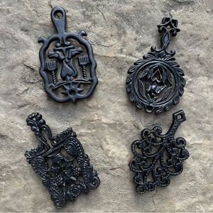 Four Small Trivets Vintage Cast Iron
